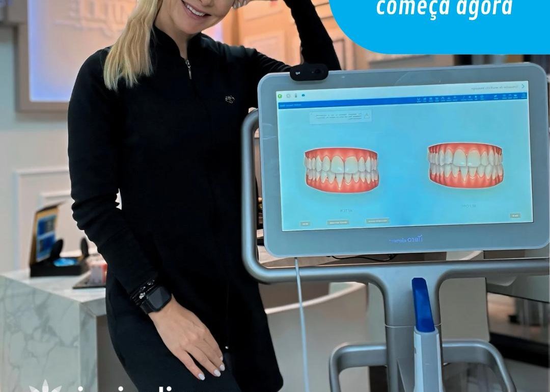 Dra. Camille ao lado do scanner intraoral iTero, com a simulação do sorriso na tela